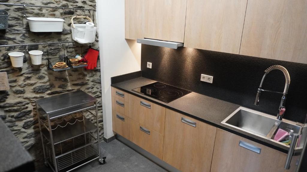 Kuchyň nebo kuchyňský kout v ubytování Cal Batlle Casa Rural