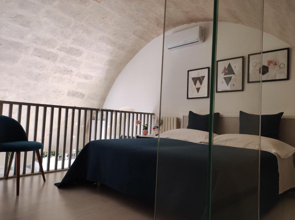 Postel nebo postele na pokoji v ubytování Il Vicolo