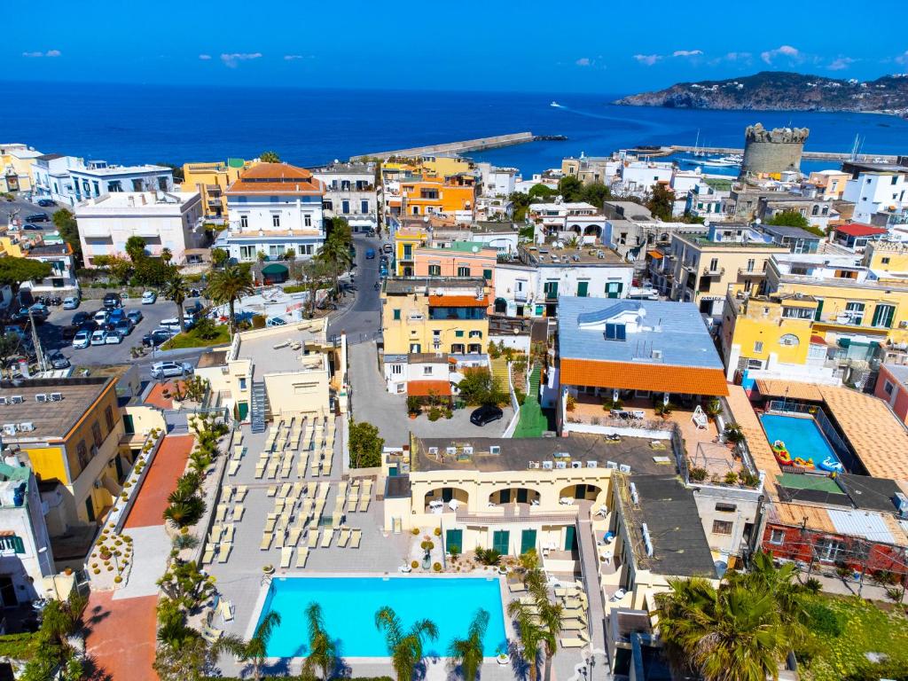 an aerial view of a city with the ocean at Casthotels Punta del Sole Terme in Ischia