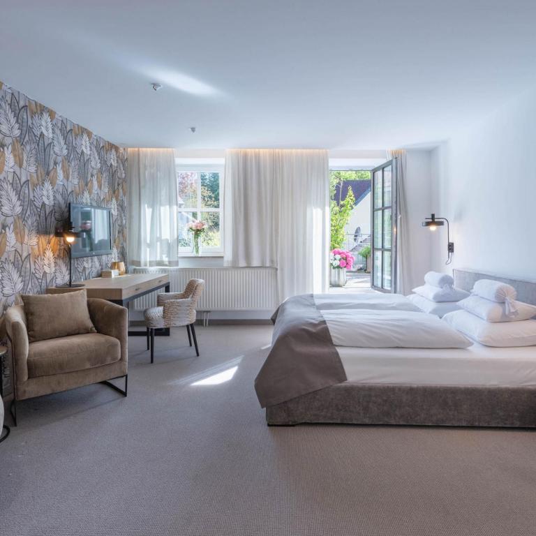 Postel nebo postele na pokoji v ubytování Hotel Forstinger - Boutique Hotel Schärding