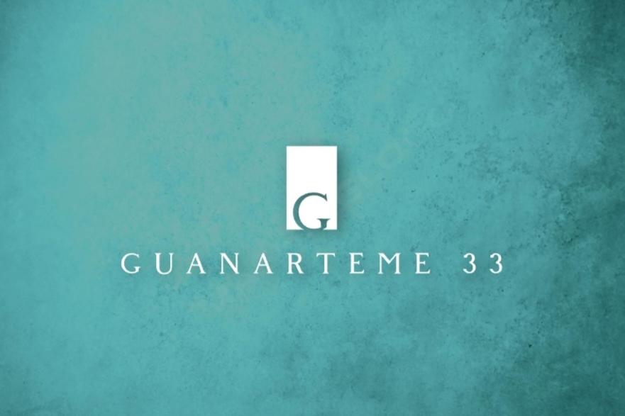 a logo for a company called camaraderie at GUANARTEME 33 in Las Palmas de Gran Canaria