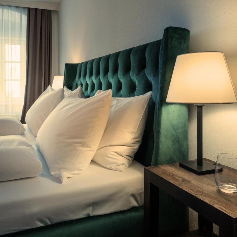 Postel nebo postele na pokoji v ubytování Hotel Forstinger - Boutique Hotel Schärding