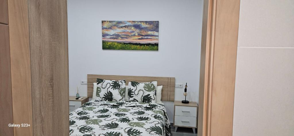 Postel nebo postele na pokoji v ubytování chalet El campillo