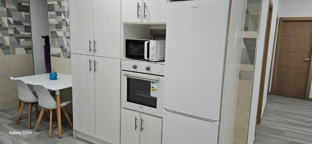 Kuchyň nebo kuchyňský kout v ubytování chalet El campillo