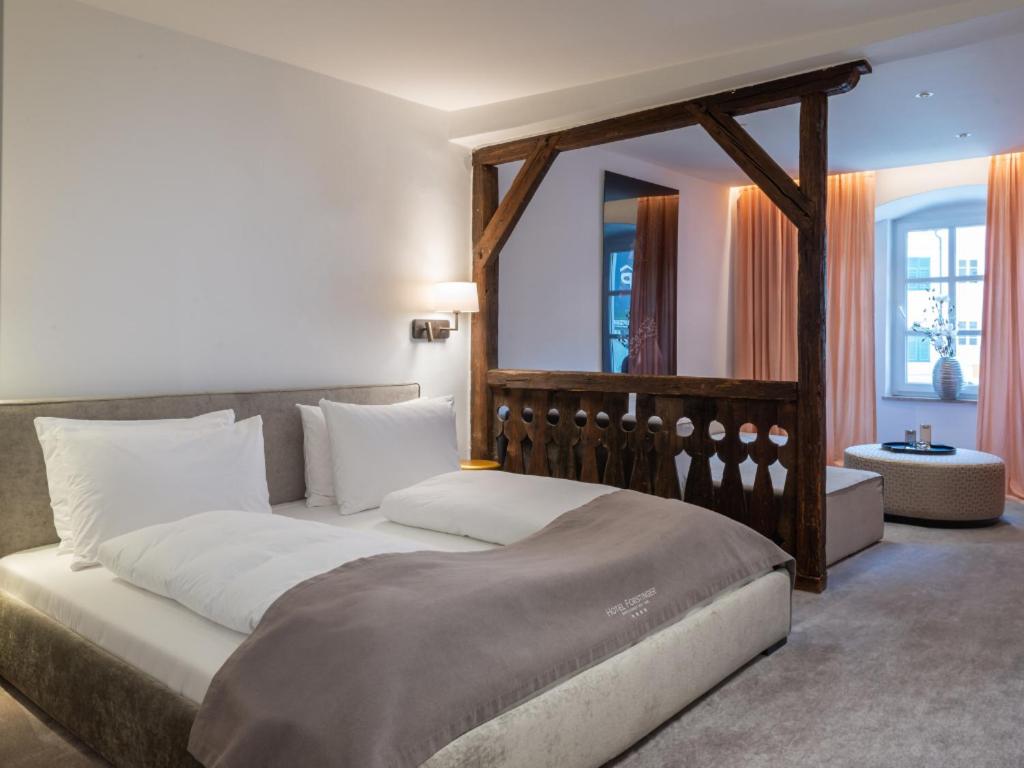 Postel nebo postele na pokoji v ubytování Hotel Forstinger - Boutique Hotel Schärding