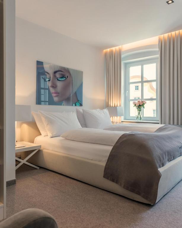 Postel nebo postele na pokoji v ubytování Hotel Forstinger - Boutique Hotel Schärding