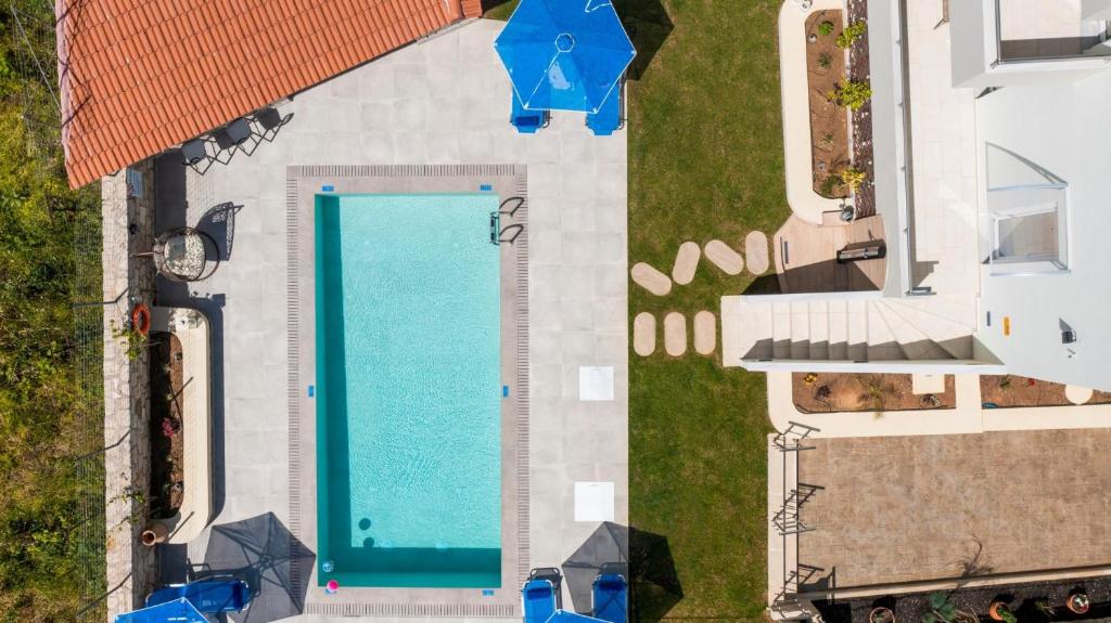 A view of the pool at Villa Pan Areti Rethymno or nearby