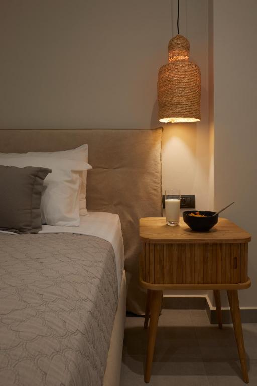 Uma cama ou camas num quarto em Mayu Suites