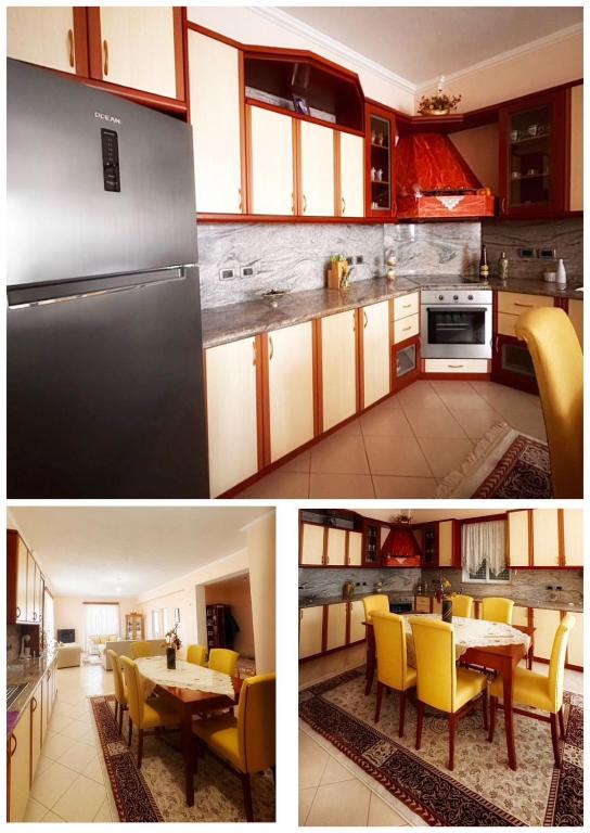 a kitchen with yellow chairs and a table in it at Tatjana`s Apartment in Sarandë