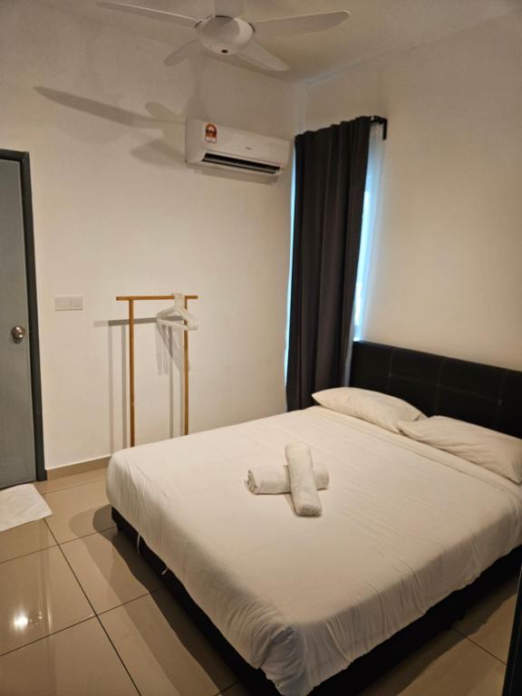 Postel nebo postele na pokoji v ubytování Metropol Serviced Apartment Bukit Mertajam Perda