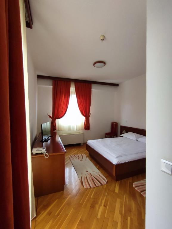 Postel nebo postele na pokoji v ubytování Hotel M3
