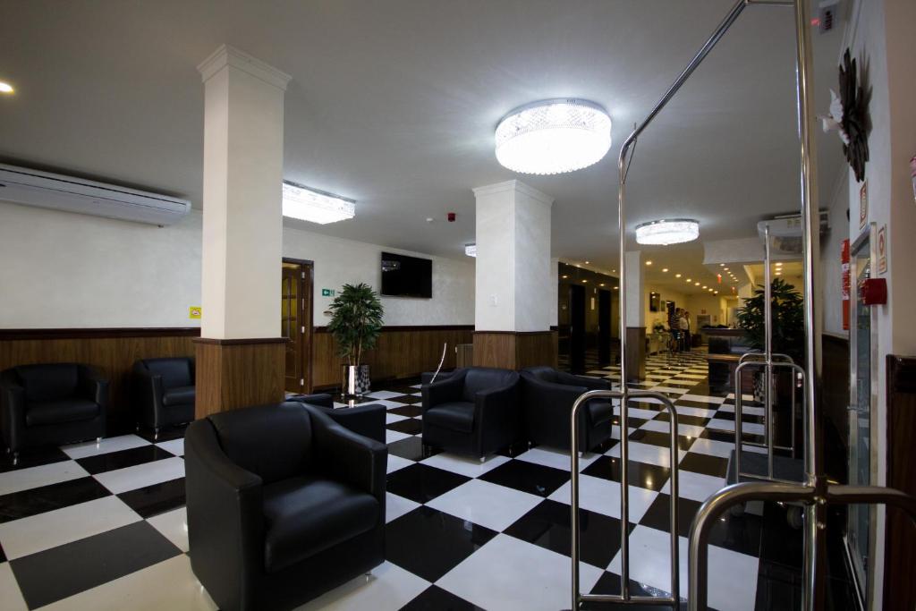 TV a/nebo společenská místnost v ubytování Bogari Hotel