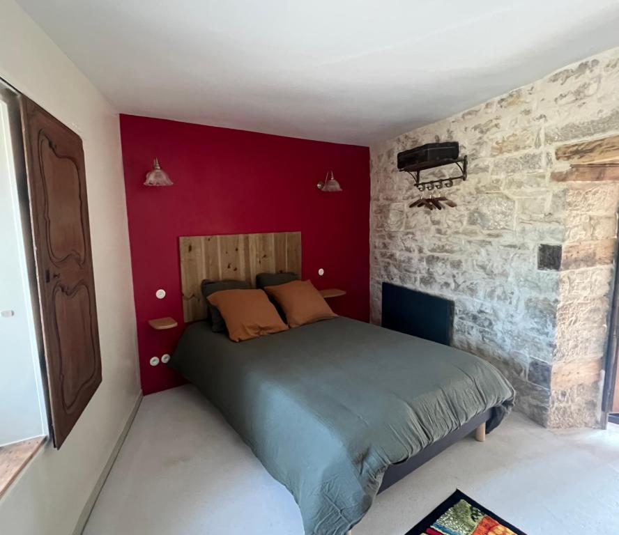 Postel nebo postele na pokoji v ubytování La Forge de Malpas
