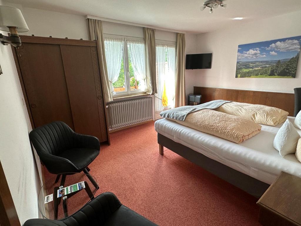 Postel nebo postele na pokoji v ubytování Hotel Zartenbach
