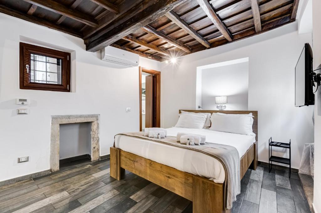 Posteľ alebo postele v izbe v ubytovaní Chiavari Apartment