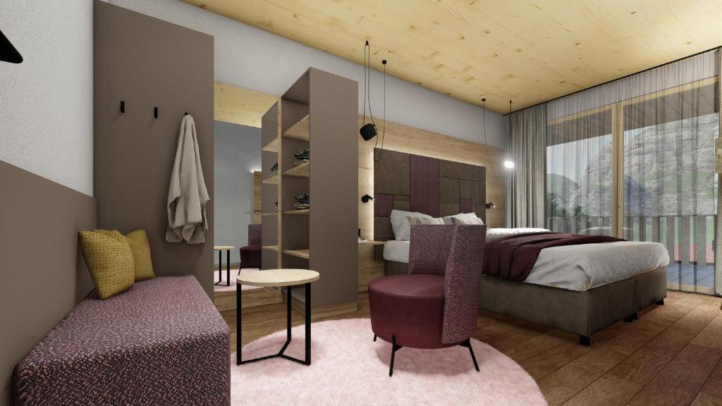 um quarto com uma cama, uma mesa e cadeiras em Hotel zum Schwanen - Appartement 6 em Pflach