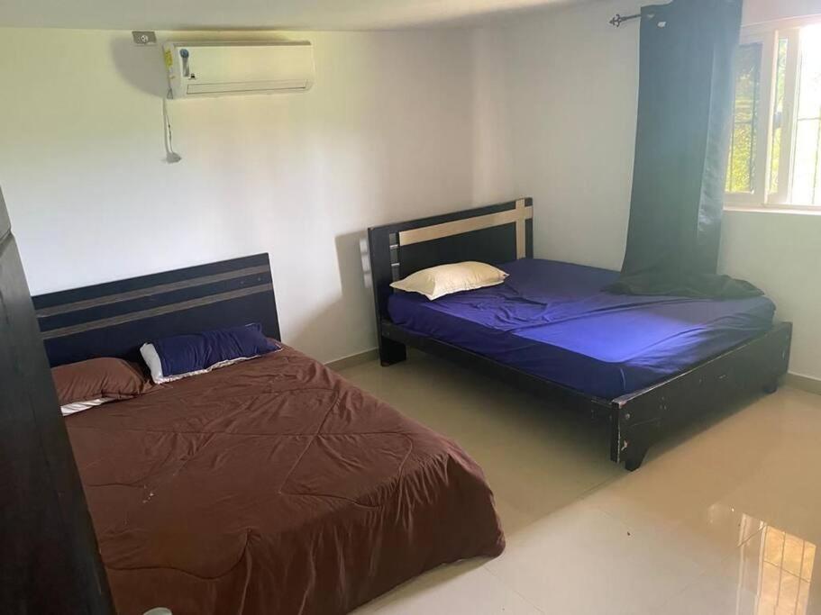 Katil atau katil-katil dalam bilik di cabaña la soñada
