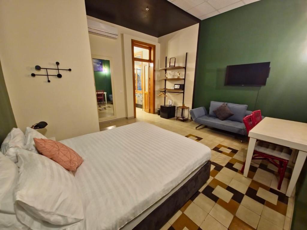 Postel nebo postele na pokoji v ubytování INTA Hotel