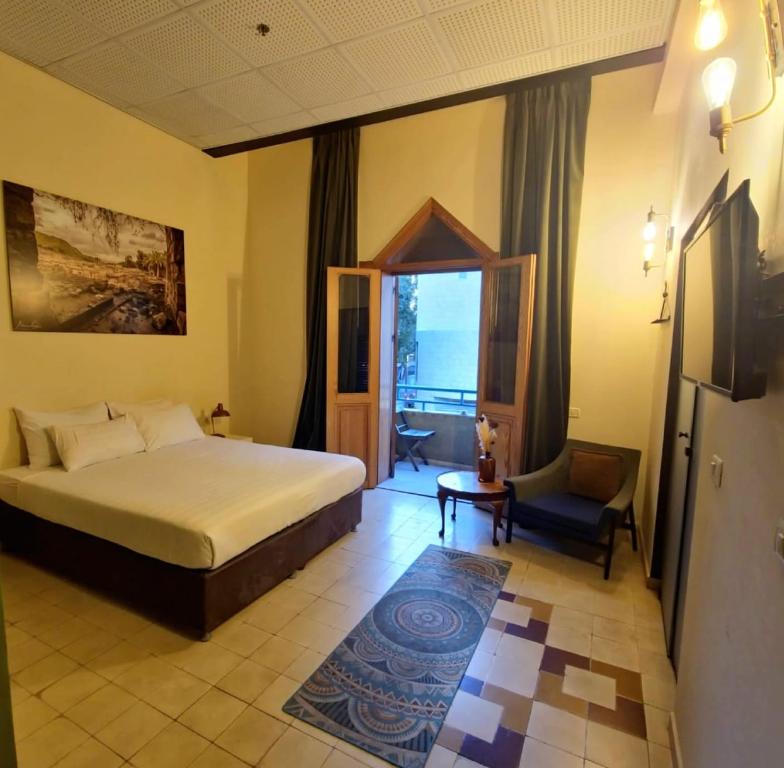Postel nebo postele na pokoji v ubytování INTA Hotel