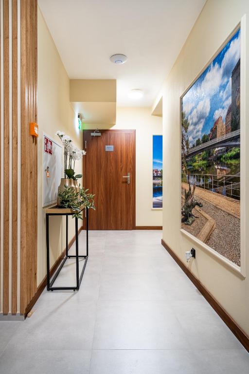 TV a/nebo společenská místnost v ubytování Pensjonat eSENtia