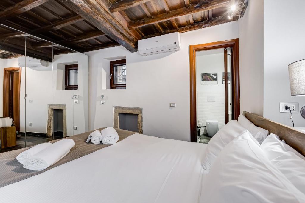 Posteľ alebo postele v izbe v ubytovaní Chiavari Apartment