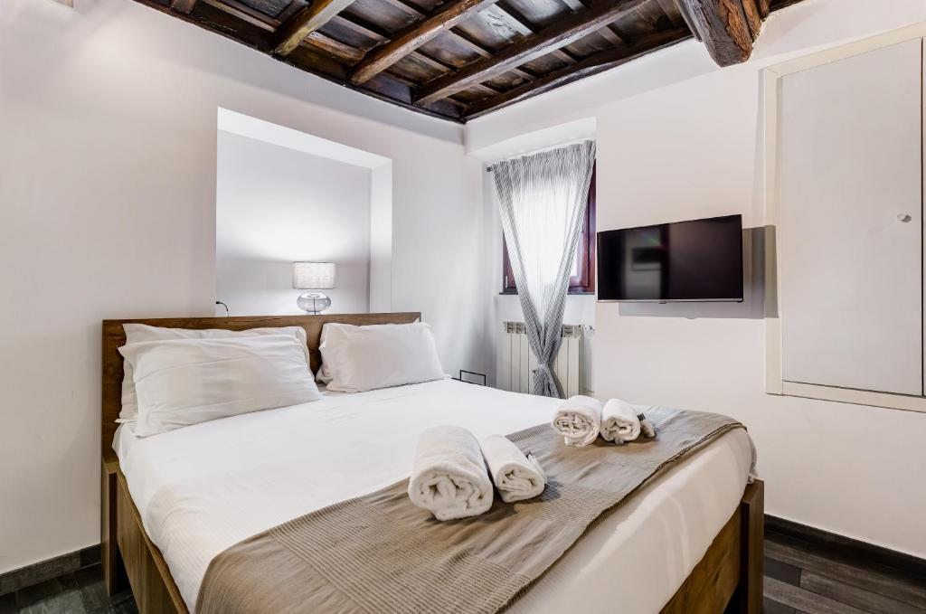 Posteľ alebo postele v izbe v ubytovaní Chiavari Apartment