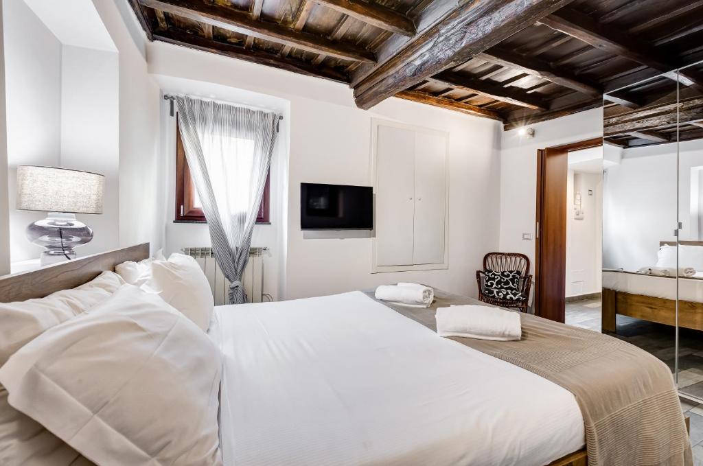 Posteľ alebo postele v izbe v ubytovaní Chiavari Apartment