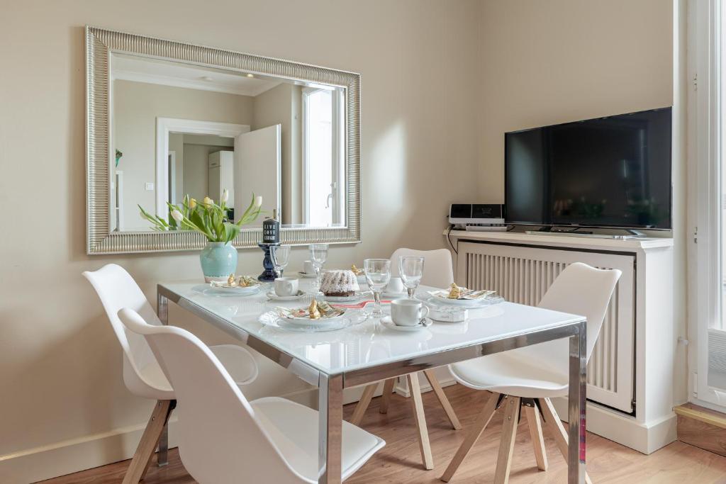 TV a/nebo společenská místnost v ubytování Villa Frische Brise 5 Herzmuschel