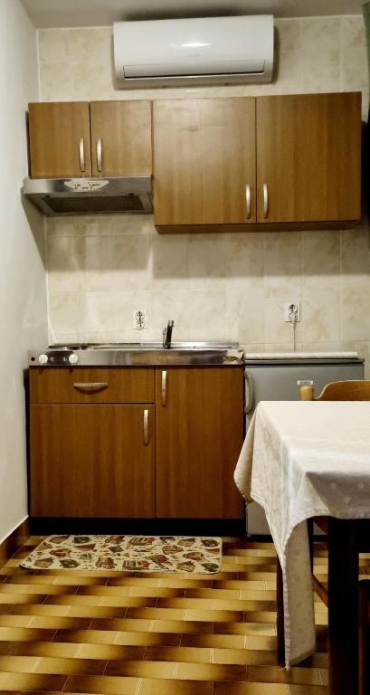 Kuchyň nebo kuchyňský kout v ubytování Nadija Rooms Funtana