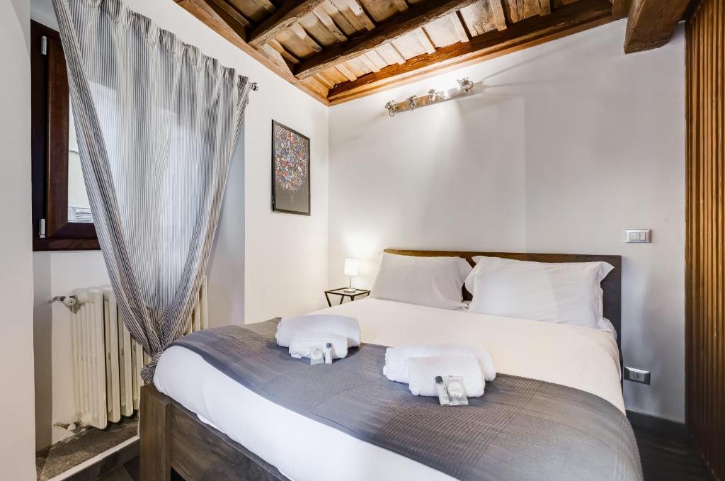 Posteľ alebo postele v izbe v ubytovaní Chiavari Apartment