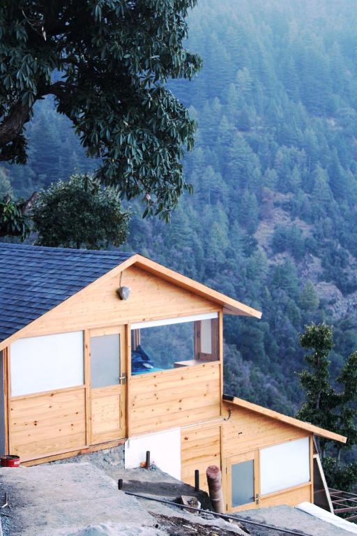 a house on top of a mountain at THE GRAND RESORT DHANOLTI in Dhanaulti