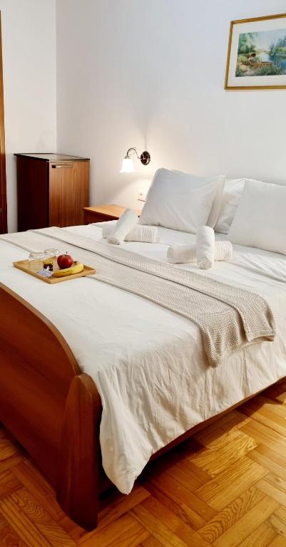 Postel nebo postele na pokoji v ubytování Nadija Rooms Funtana