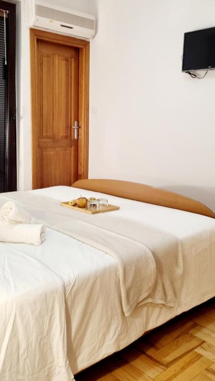 Postel nebo postele na pokoji v ubytování Nadija Rooms Funtana