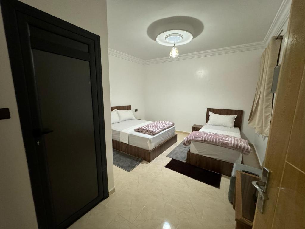Postel nebo postele na pokoji v ubytování Hotel Ahmed Ali