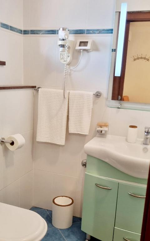 Koupelna v ubytování Nadija Rooms Funtana