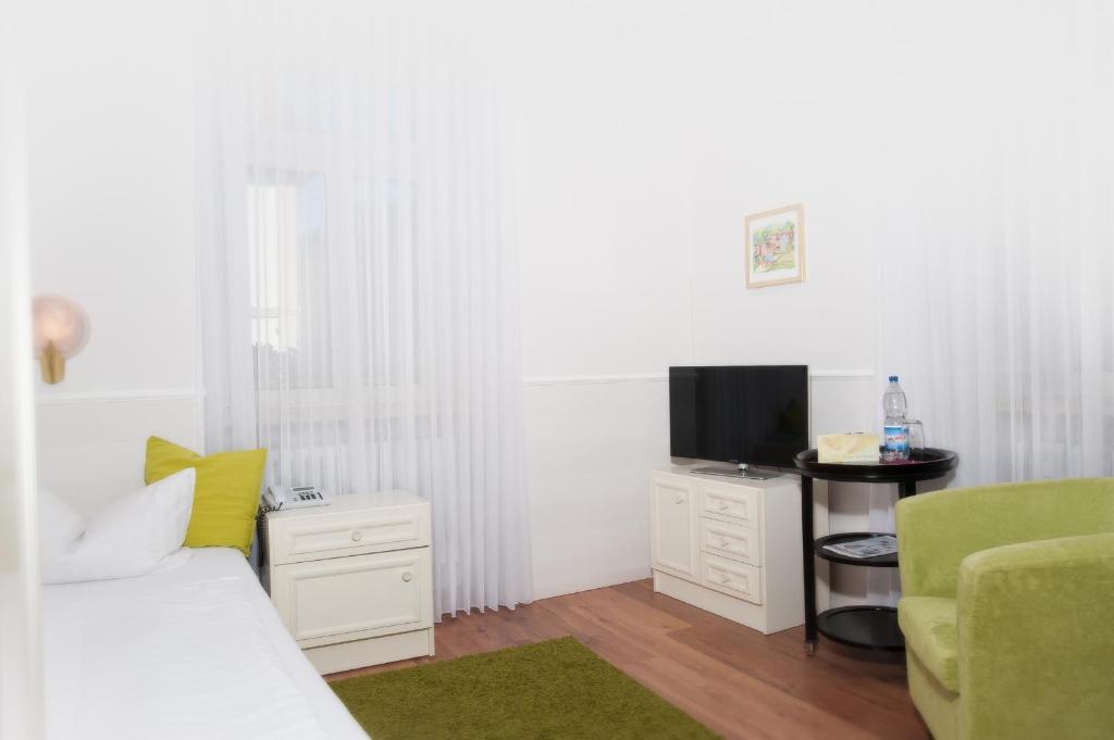 TV a/nebo společenská místnost v ubytování Pension Villa Nordland