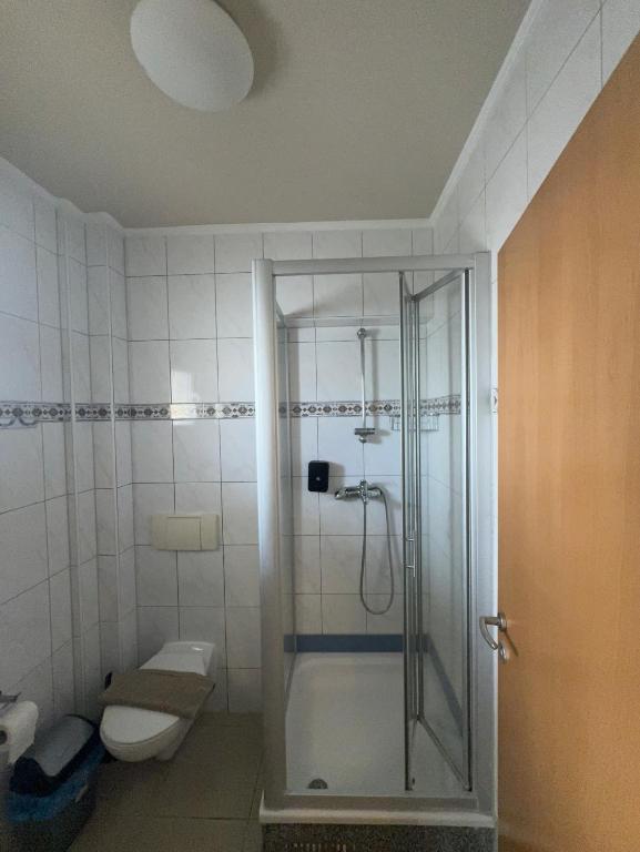 Koupelna v ubytování Comfort Hotel Apartments