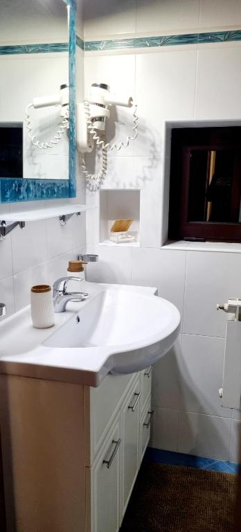 Kuchyň nebo kuchyňský kout v ubytování Nadija Rooms Funtana