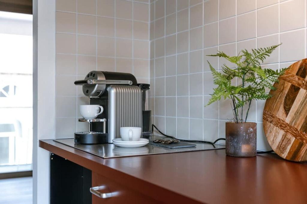 Kuchyň nebo kuchyňský kout v ubytování Huswell - Bonrepo Room 104