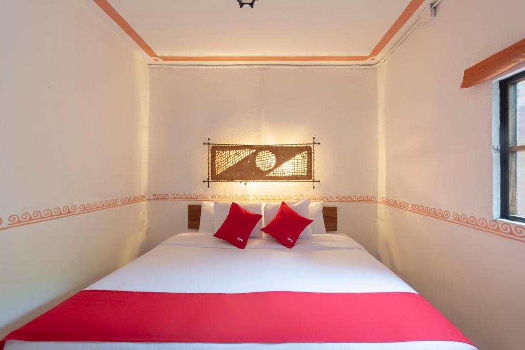 Postel nebo postele na pokoji v ubytování Hotel Coyopolan