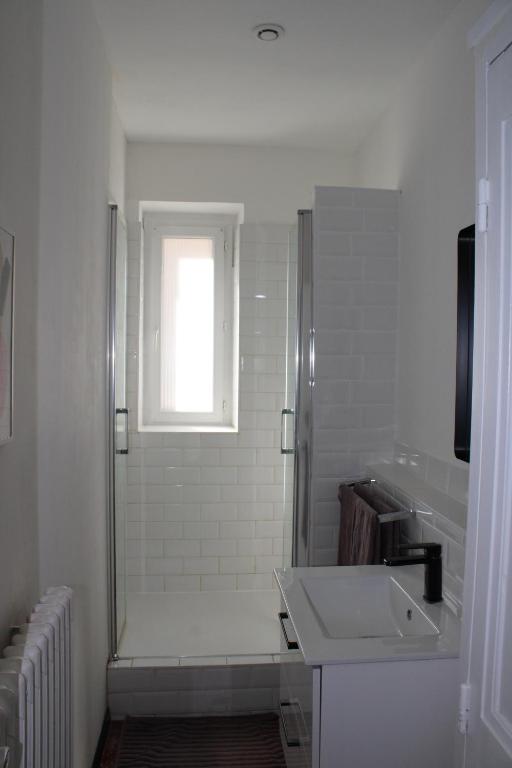 Kúpeľňa v ubytovaní Superbe appartement avec parking sur place