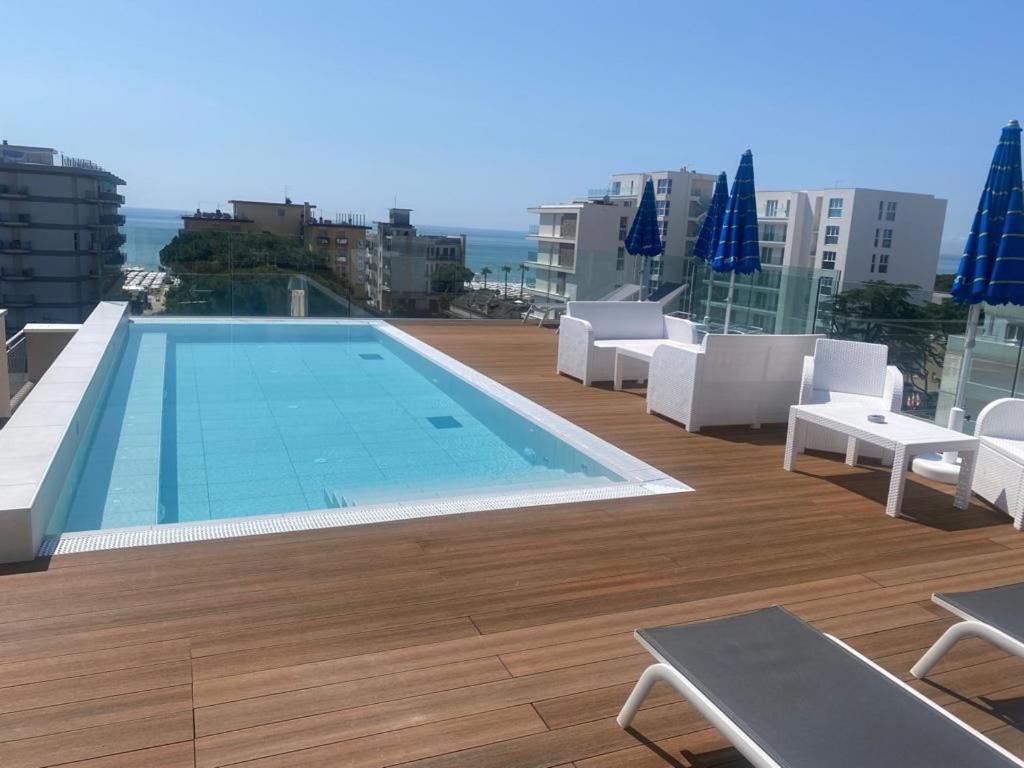 a swimming pool on the roof of a building at Hotel Villa Eugenia - 3 Stelle Superior con Private SPA e Piscina in Lido di Jesolo