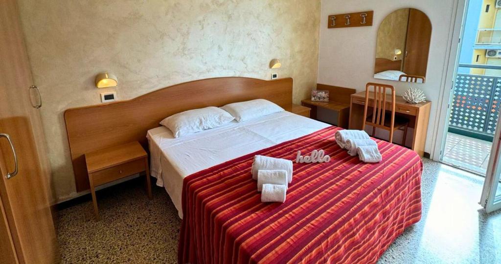 Postel nebo postele na pokoji v ubytování Hotel Caruso