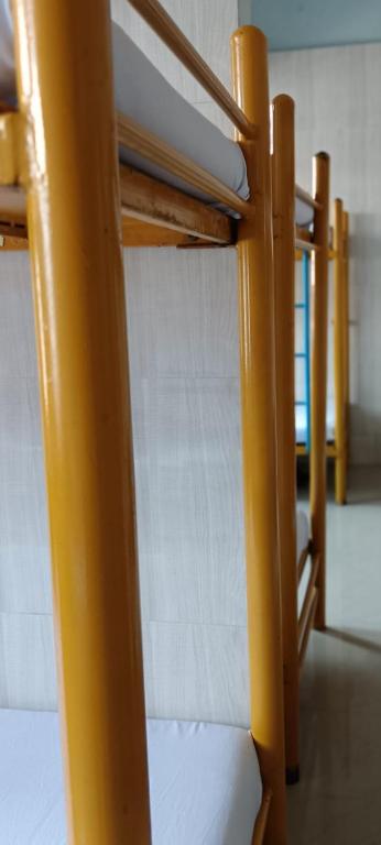 Postel nebo postele na pokoji v ubytování vrs dormitary
