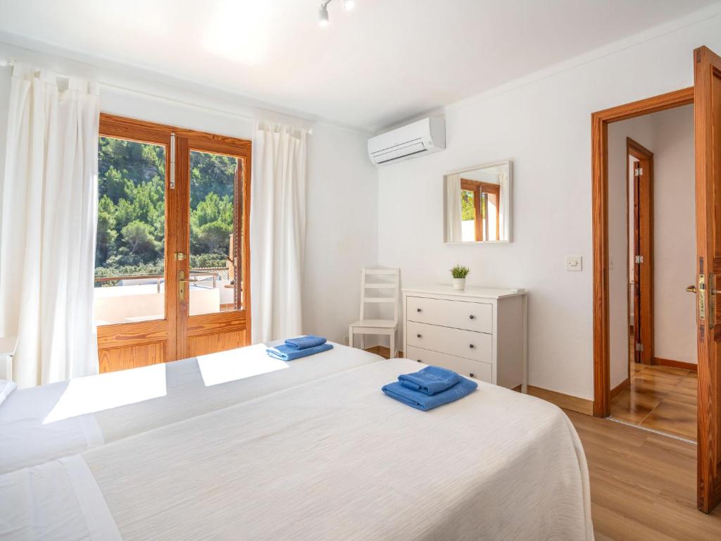 Postel nebo postele na pokoji v ubytování Holiday Home Clara R by Interhome