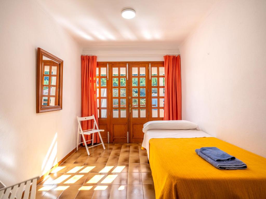 Postel nebo postele na pokoji v ubytování Holiday Home Clara R by Interhome