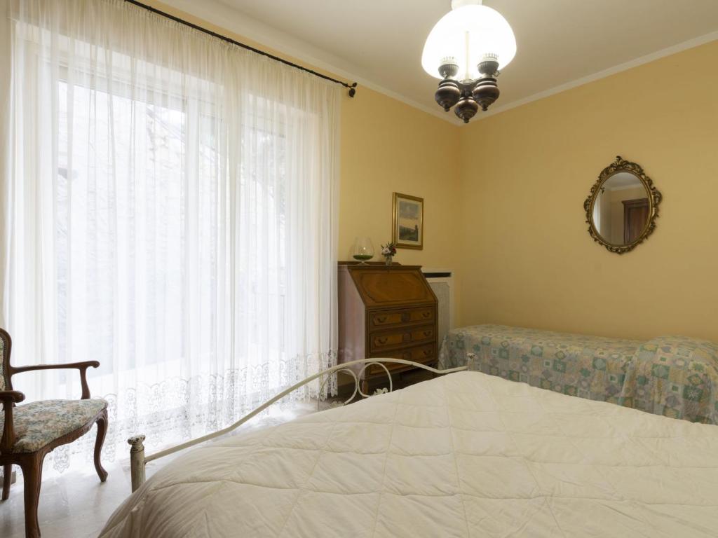 A bed or beds in a room at Holiday Home Irma by Interhome