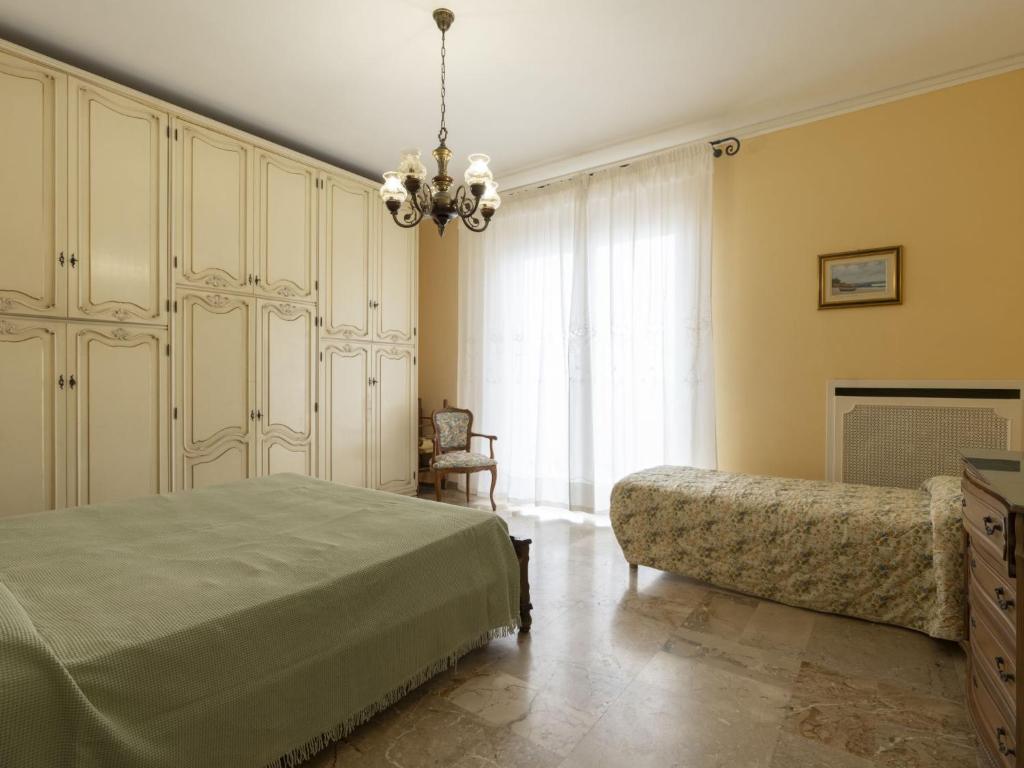 A bed or beds in a room at Holiday Home Irma by Interhome