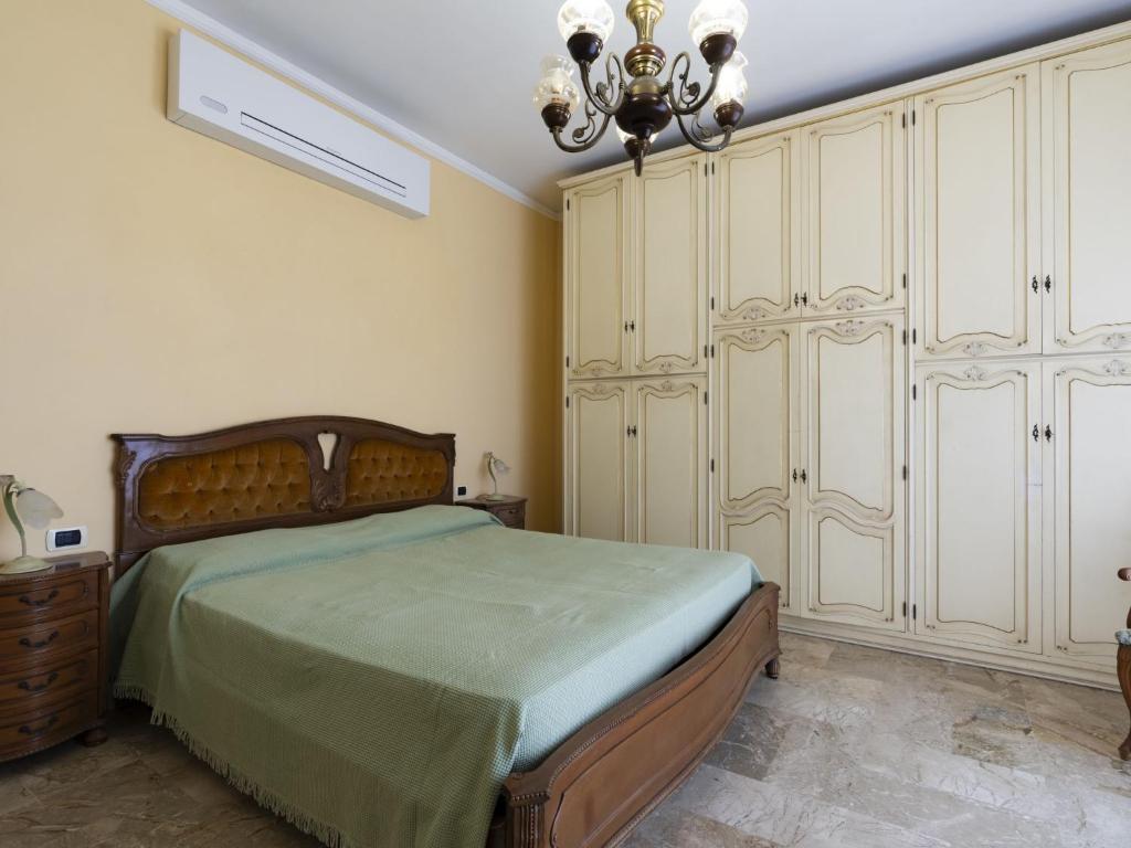 A bed or beds in a room at Holiday Home Irma by Interhome