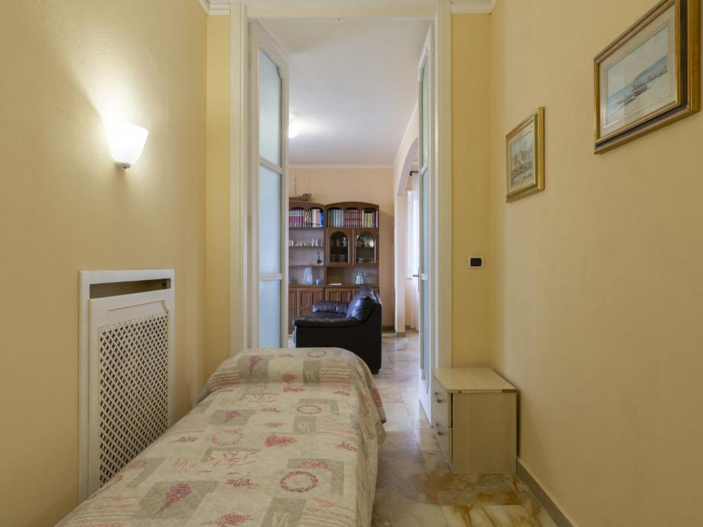 A bed or beds in a room at Holiday Home Irma by Interhome